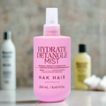 NAK Signature Hydrate Detangle Mist detangles protects and Hydrates - On Line Hair Depot